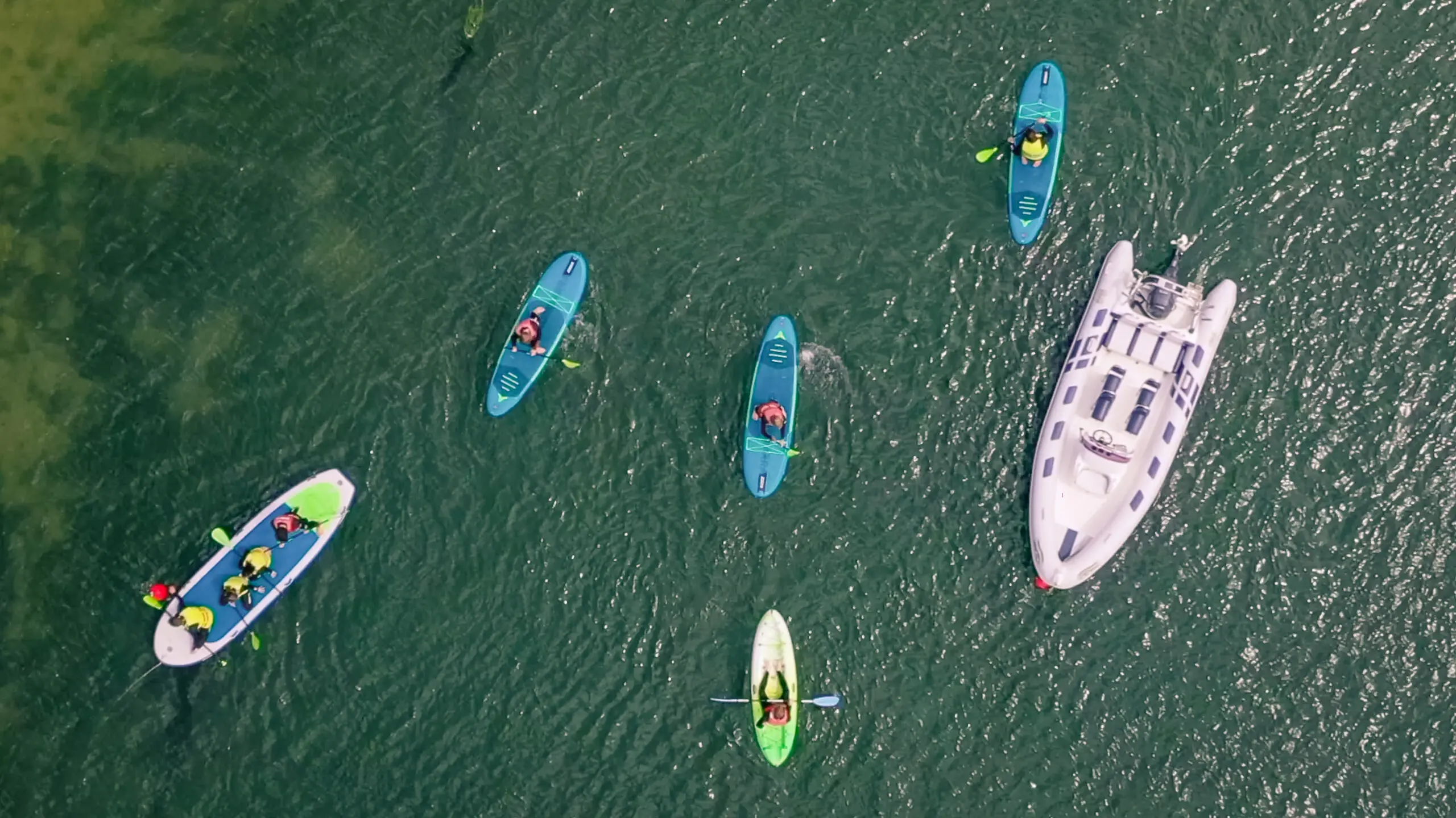 birds view picture taken of people paddleboarding the camel estuary